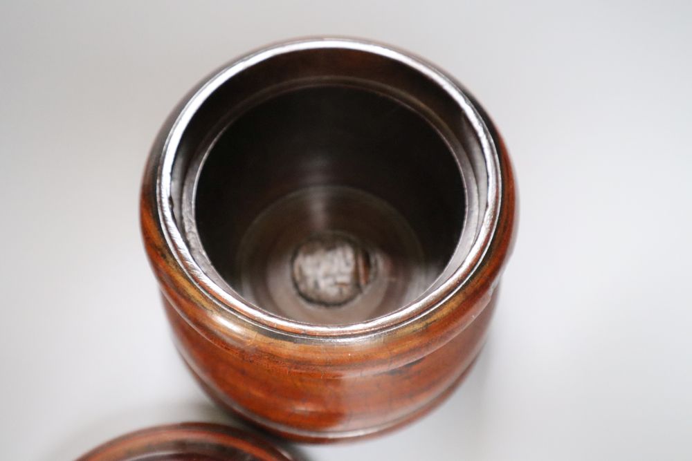 A 19th century lignum vitae string box, 18cm, and a similar tobacco? jar and cover